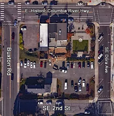 Aerial view of the unimproved Mayors Square Parking Lot at 141 SE Dora Avenue