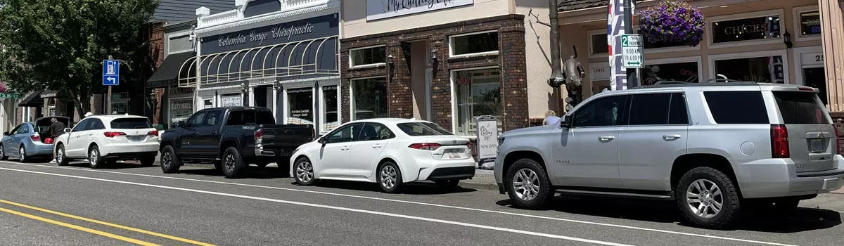 Cars parked along Historic Columbia River Highway in downtown Troutdale