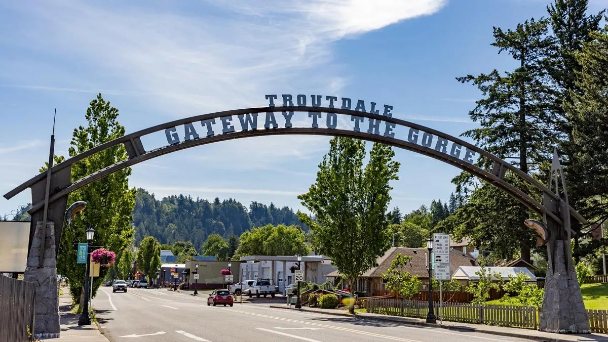 A view of Troutdale's Centennial Arch over Historic Columbia River Highway looking toward downtown
