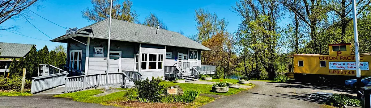 Gateway to the Gorge Visitor Center and Union Pacific Caboose at Depot Park in Troutdale