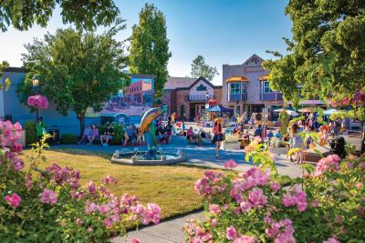 A view of downtown Troutdale  through the flowers from Mayors Square