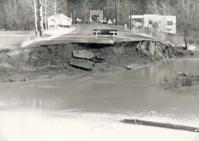 Photo B: A view to the east with the East Columbia River Highway Bridge in the far background. In the foreground is the highway 
