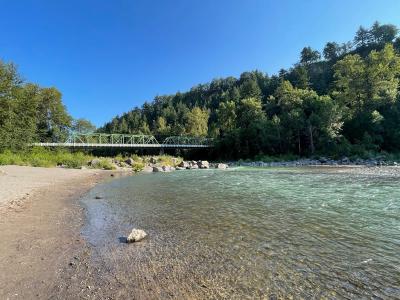 Beach at Glenn Otto Park in the foreground with the Troutdale Bridge over the Sandy River in the background