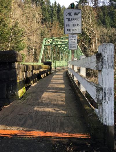 An east-facing view of the current walkway on the upstream side of the Troutdale Bridge.