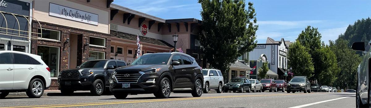 Cars parked along Historic Columbia River Highway in downtown Troutdale