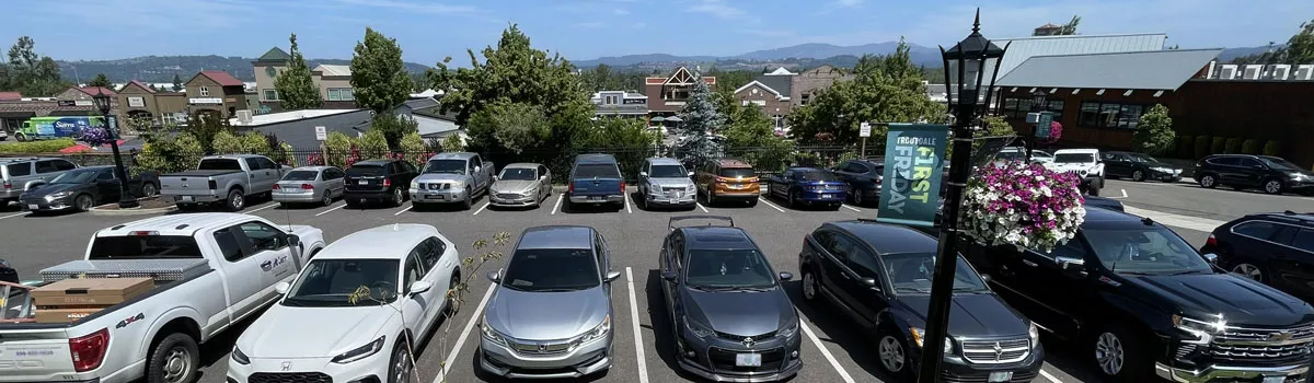 Cars parked in the Mayors Square lot in downtown Troutdale