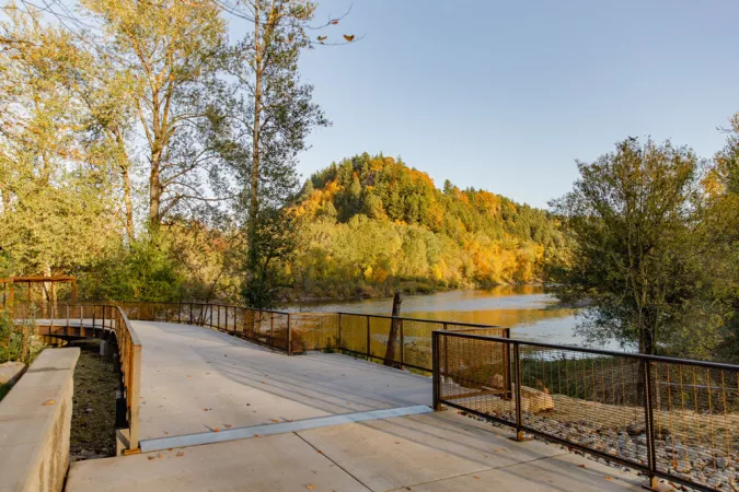 Broughton Bluff rises over the Sandy River as seen from Sharon Nesbit Heritage Park